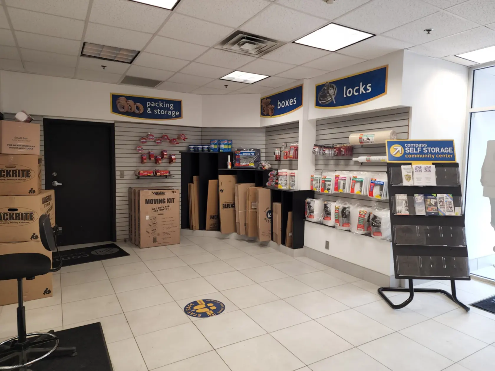 Packing supplies, boxes and locks for sale in office.