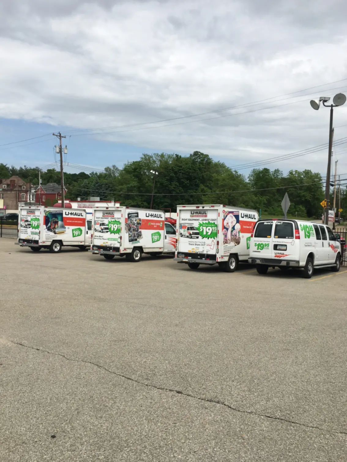 Four U-Haul vehicles available for rent.