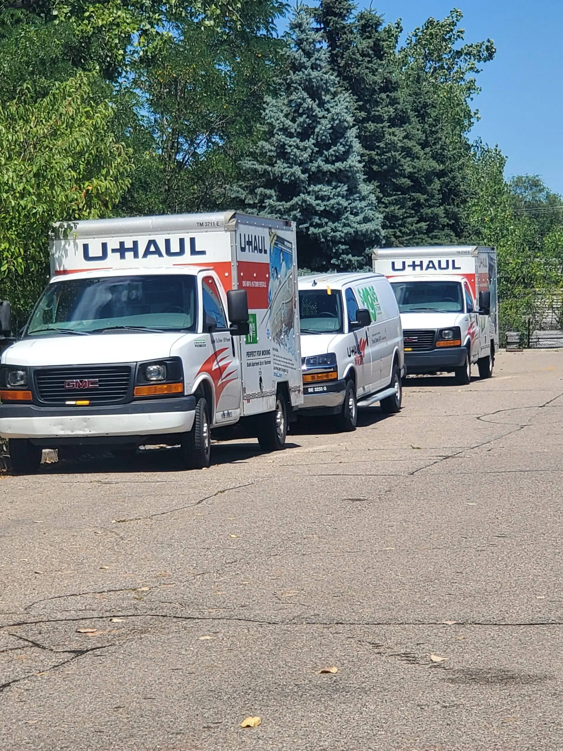 U-Haul rental trucks parked.