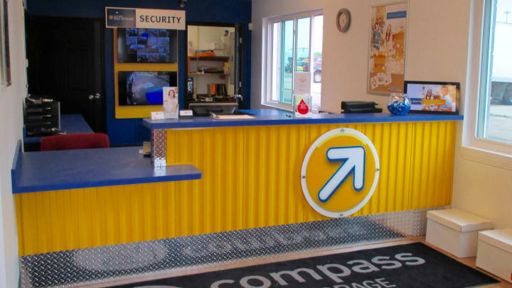 Front desk at a Compass Self Storage rental office.