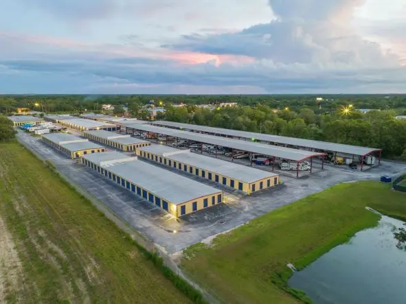 Aerial view of storage facility and surrounding area.