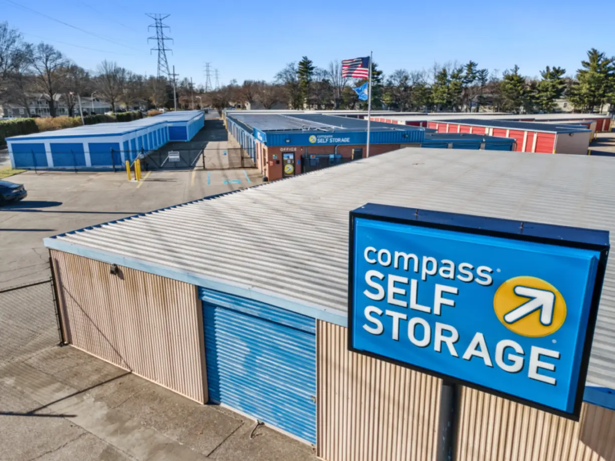Facility signage at Compass Self Storage.
