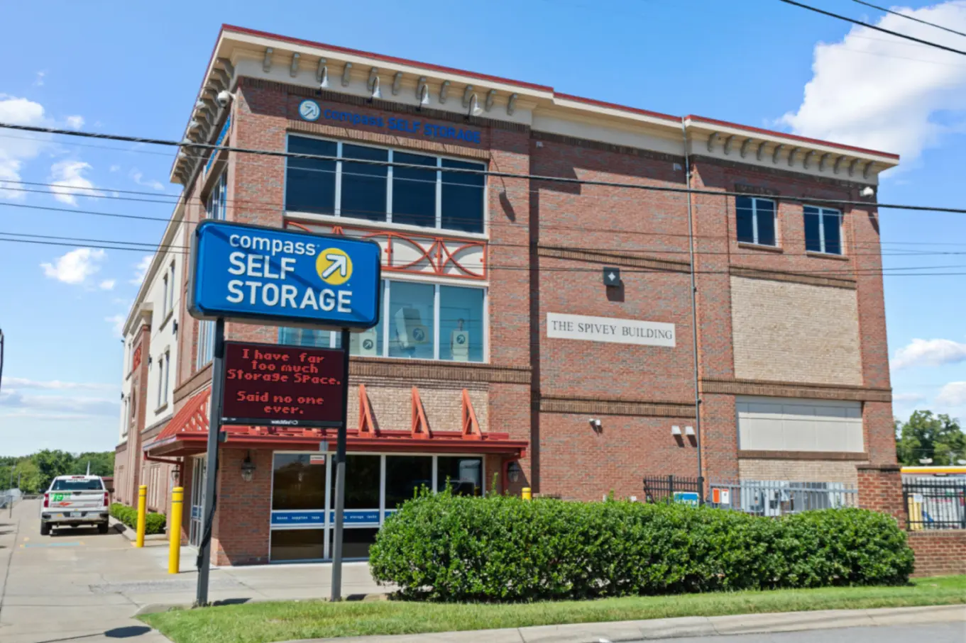 Facility signage at Compass Self Storage.