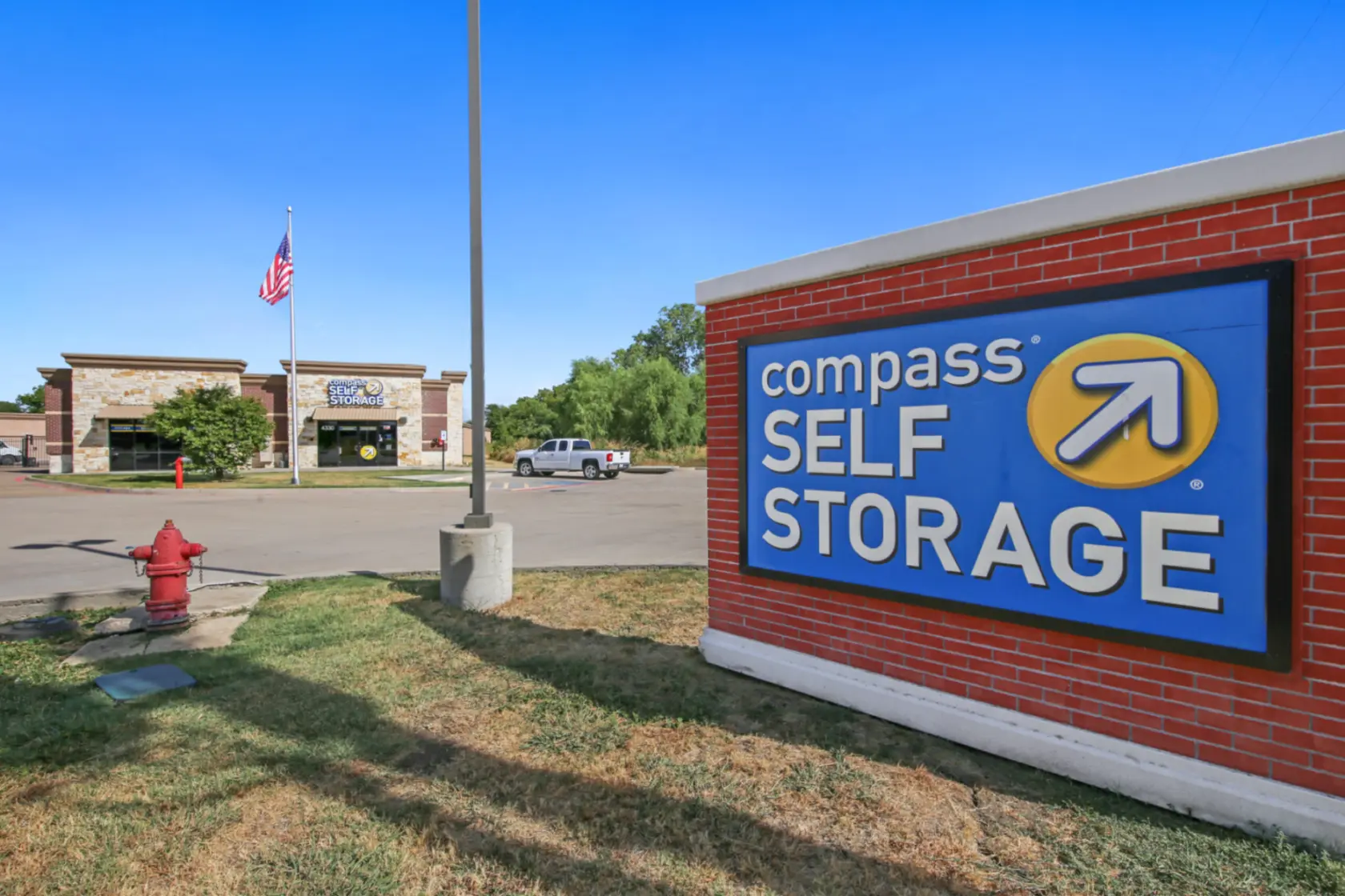 Large sign at Compass Self Storage.