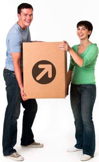 Smiling couple lifting a Compass Self Storage moving box.