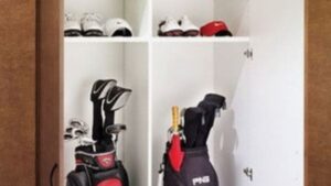 Golf clubs and gear in storage.