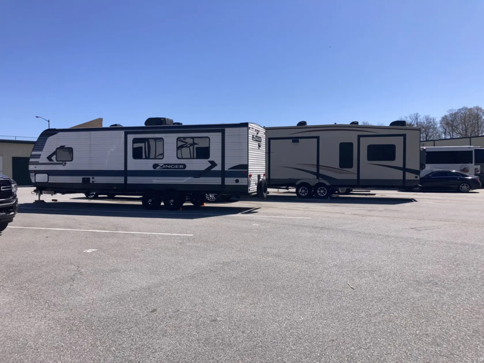 Uncovered RV parking available at Compass Self Storage facility.