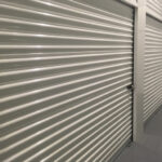 A 10x10 storage unit door with a lock.