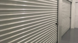 A 10x10 storage unit door with a lock.