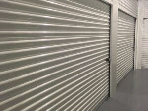 A 10x10 storage unit door with a lock.