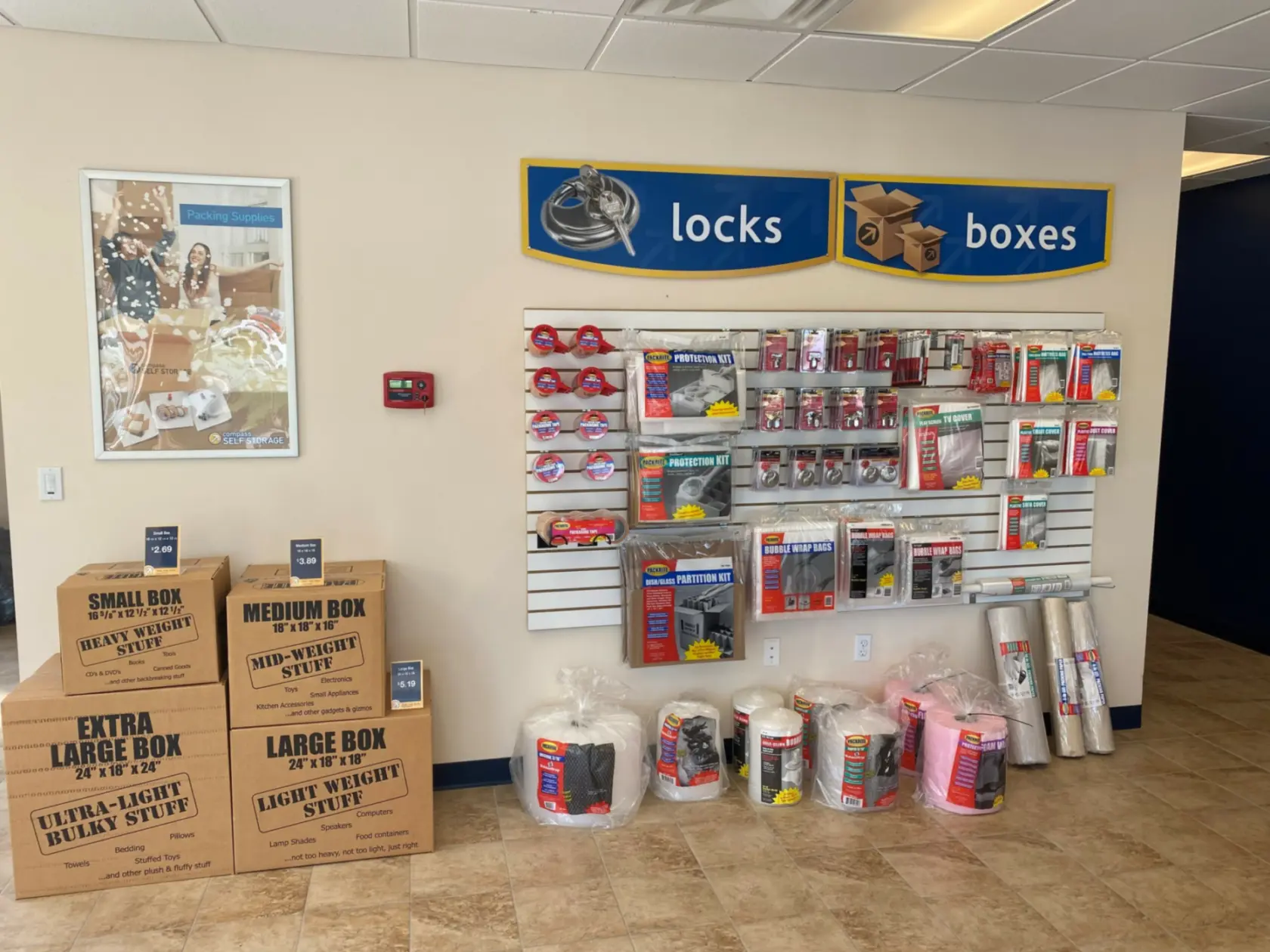 Storage supplies for sale, including locks and boxes.