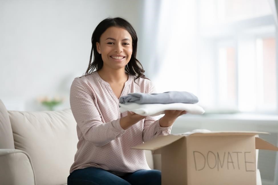 Woman donating clothes