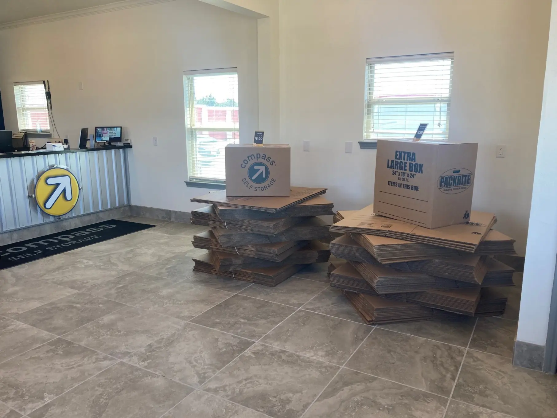 E. I-30 Rockwall example of moving boxes in front office.