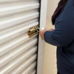 A woman opening a storage unit