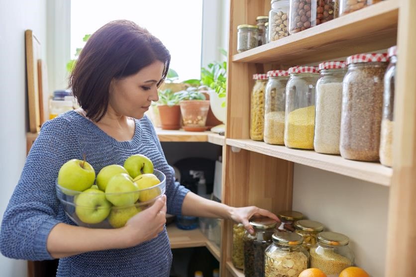 A woman organizing her kitchen