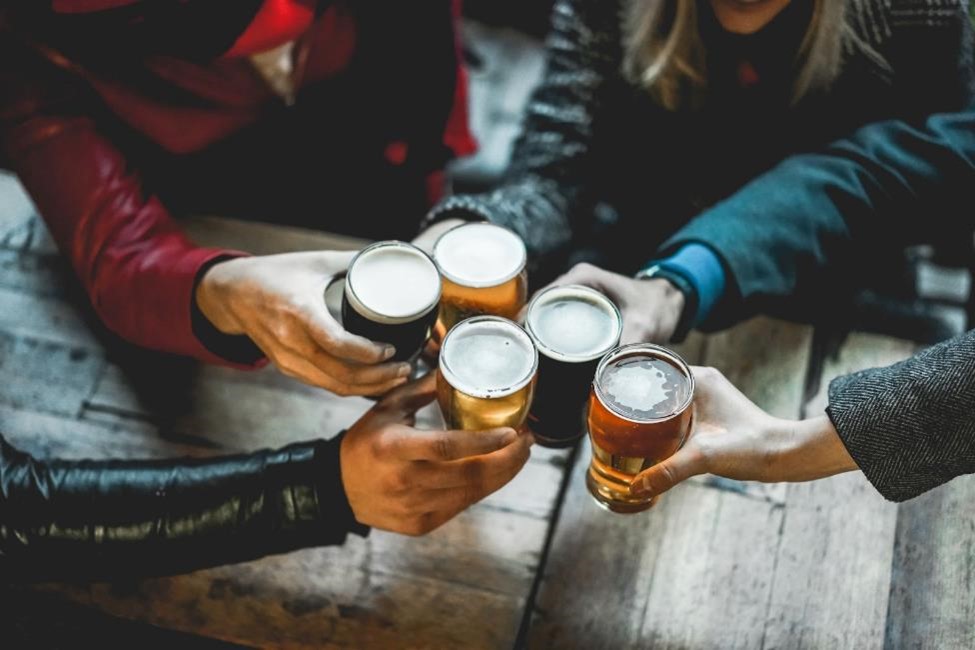 A group of people with beer