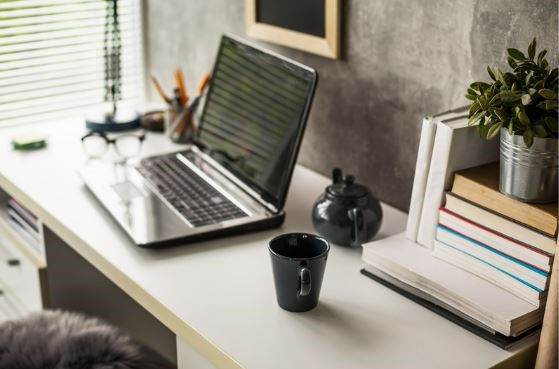 A laptop on a desk at work