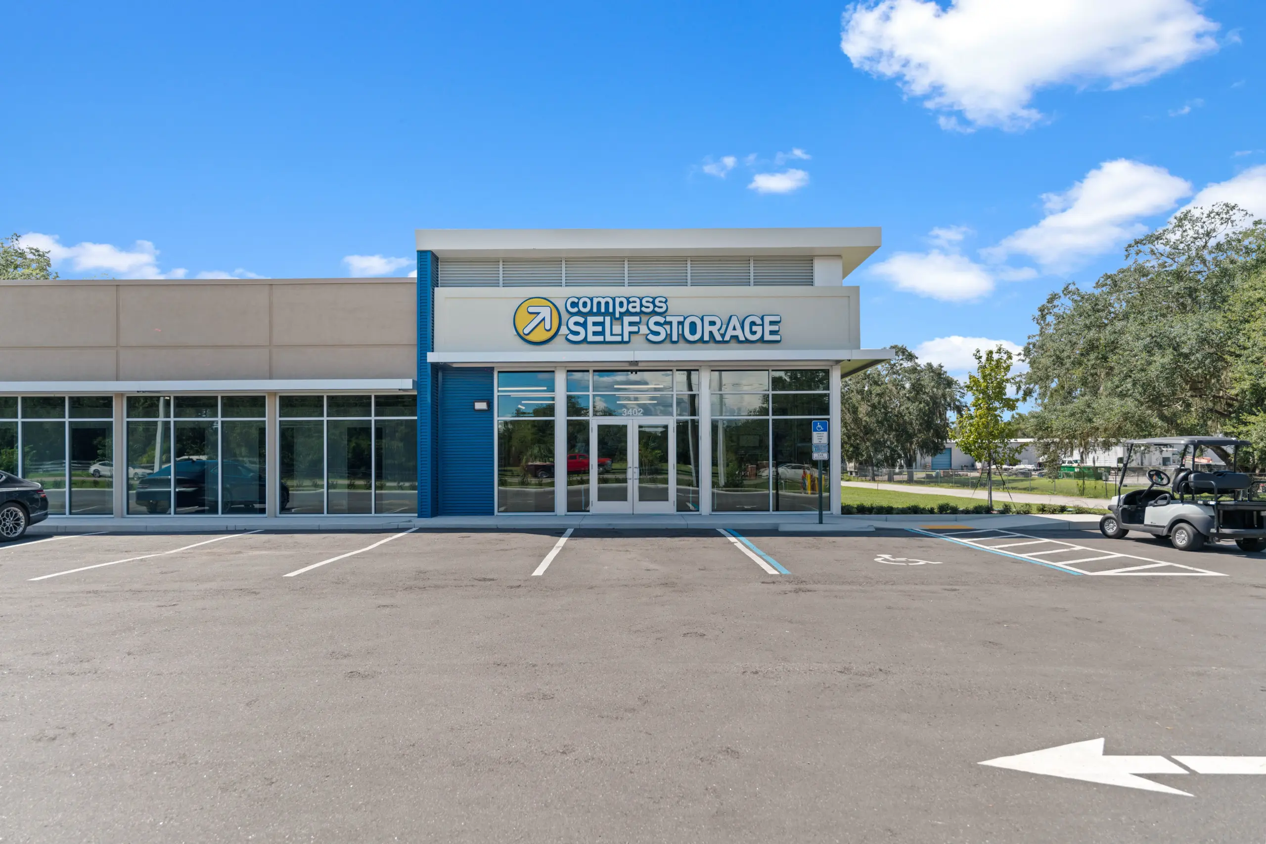 Front view of Compass Self Storage facility building.