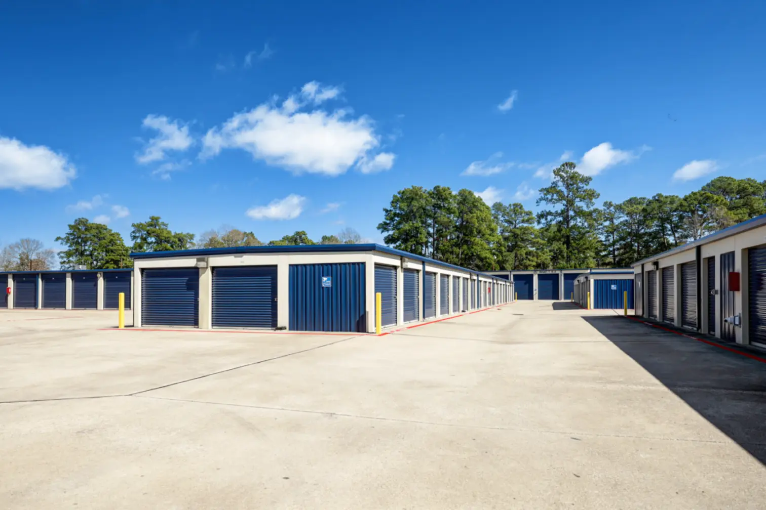Outdoor storage units at Compass Self Storage with drive-up.