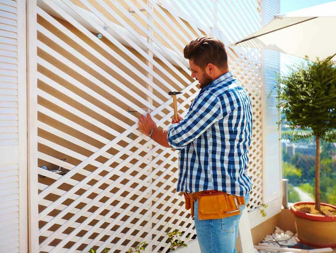 A man renovating his patio