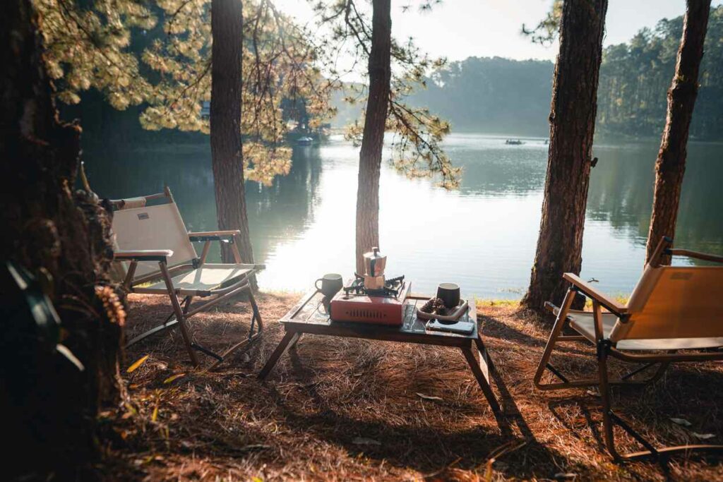 Lawn chairs and table overlooking lake