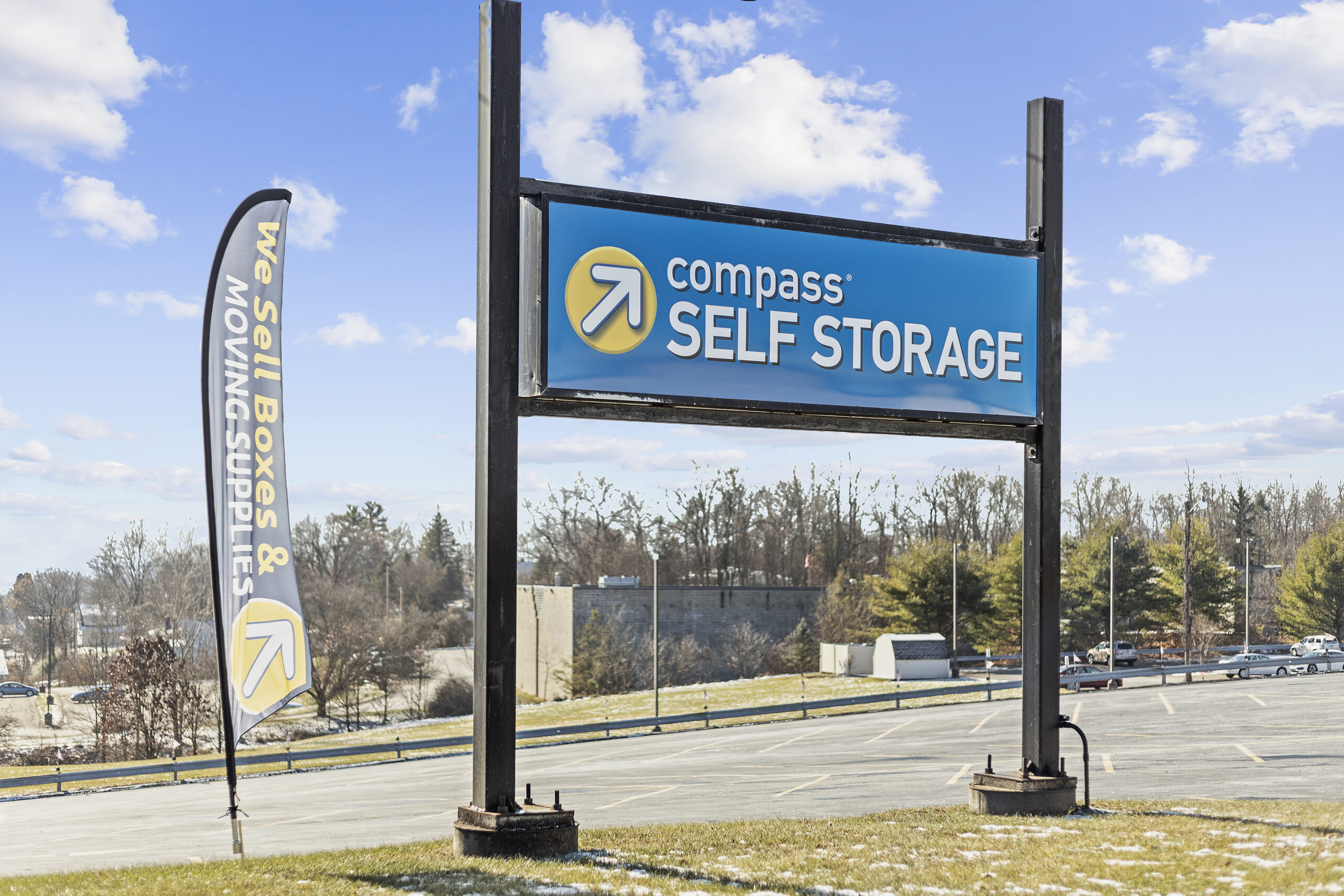 Facility signage at Compass Self Storage.