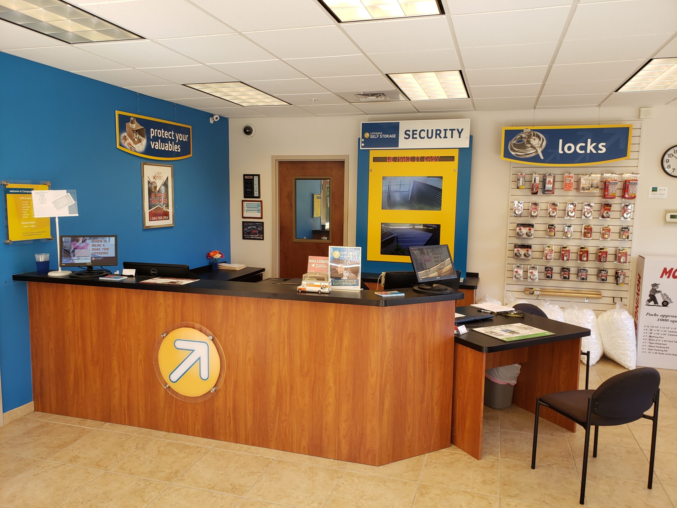 Front desk and packing supplies at Compass Self Storage.