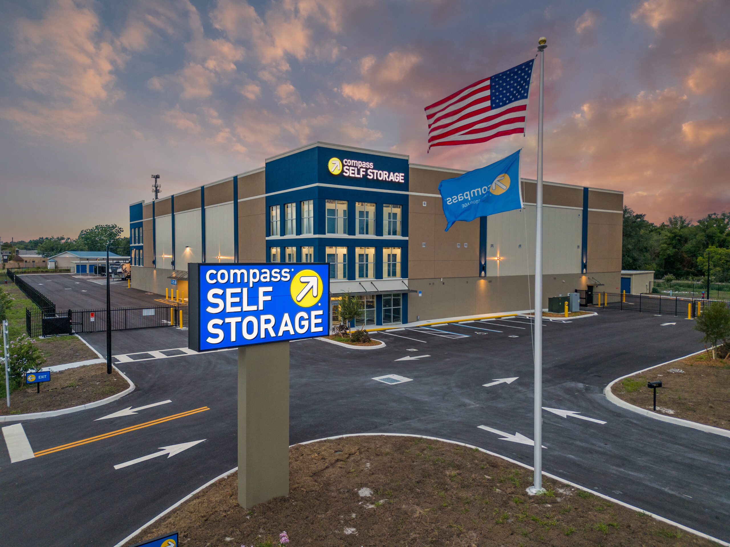 Facility signage at Compass Self Storage.