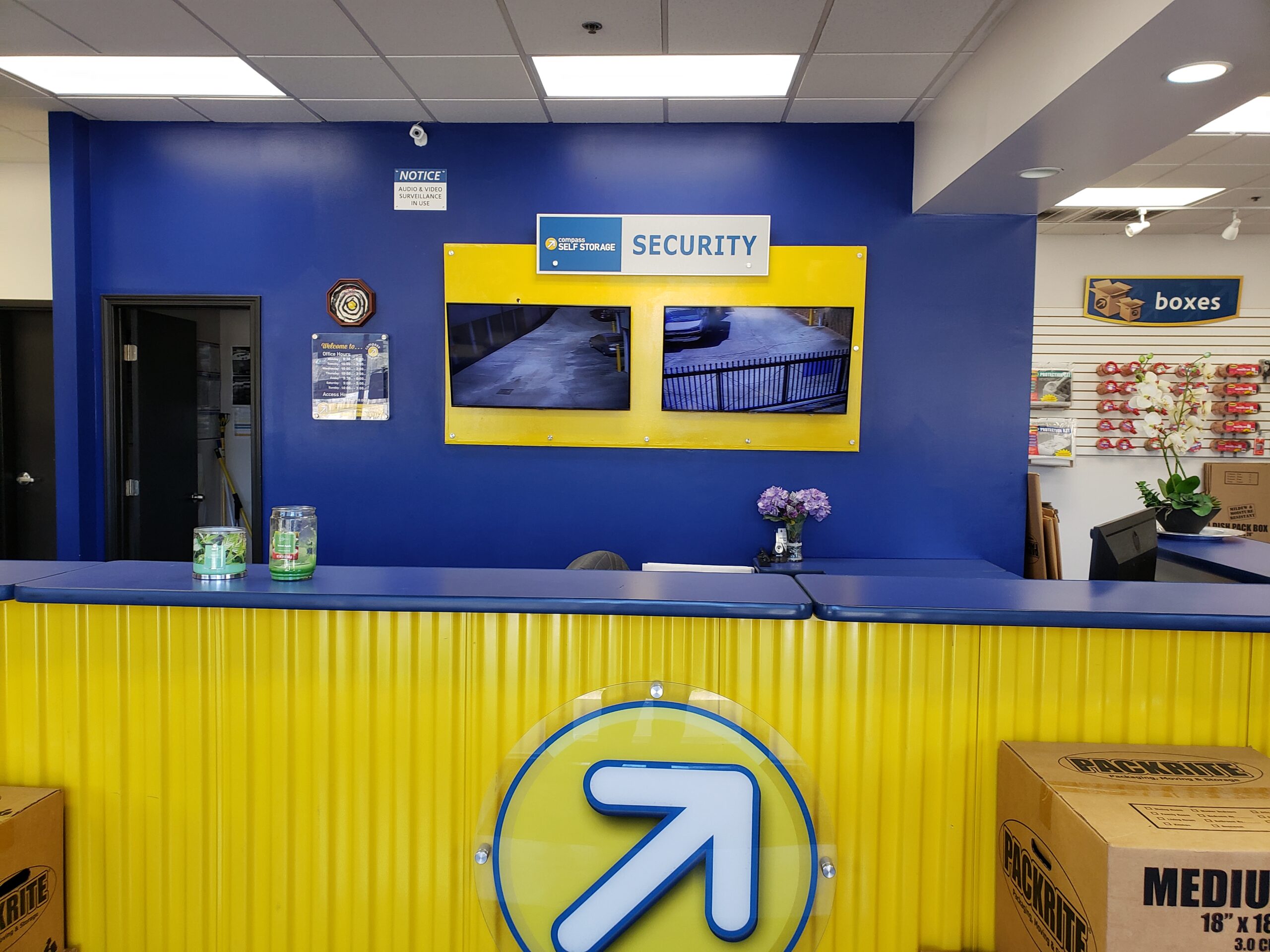 Security footage at the Compass Self Storage service desk.