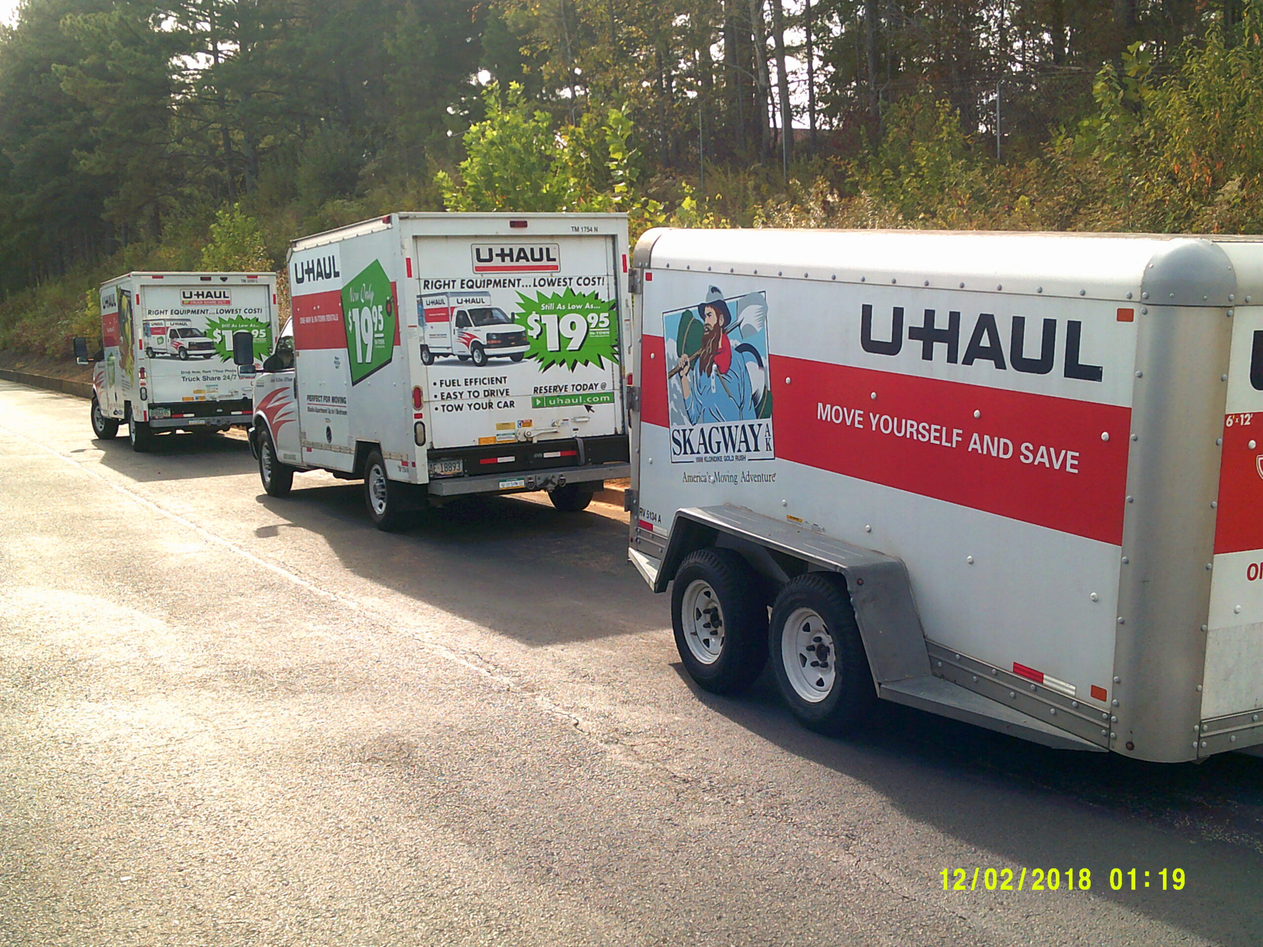 Moving trucks at Compass Self Storage.