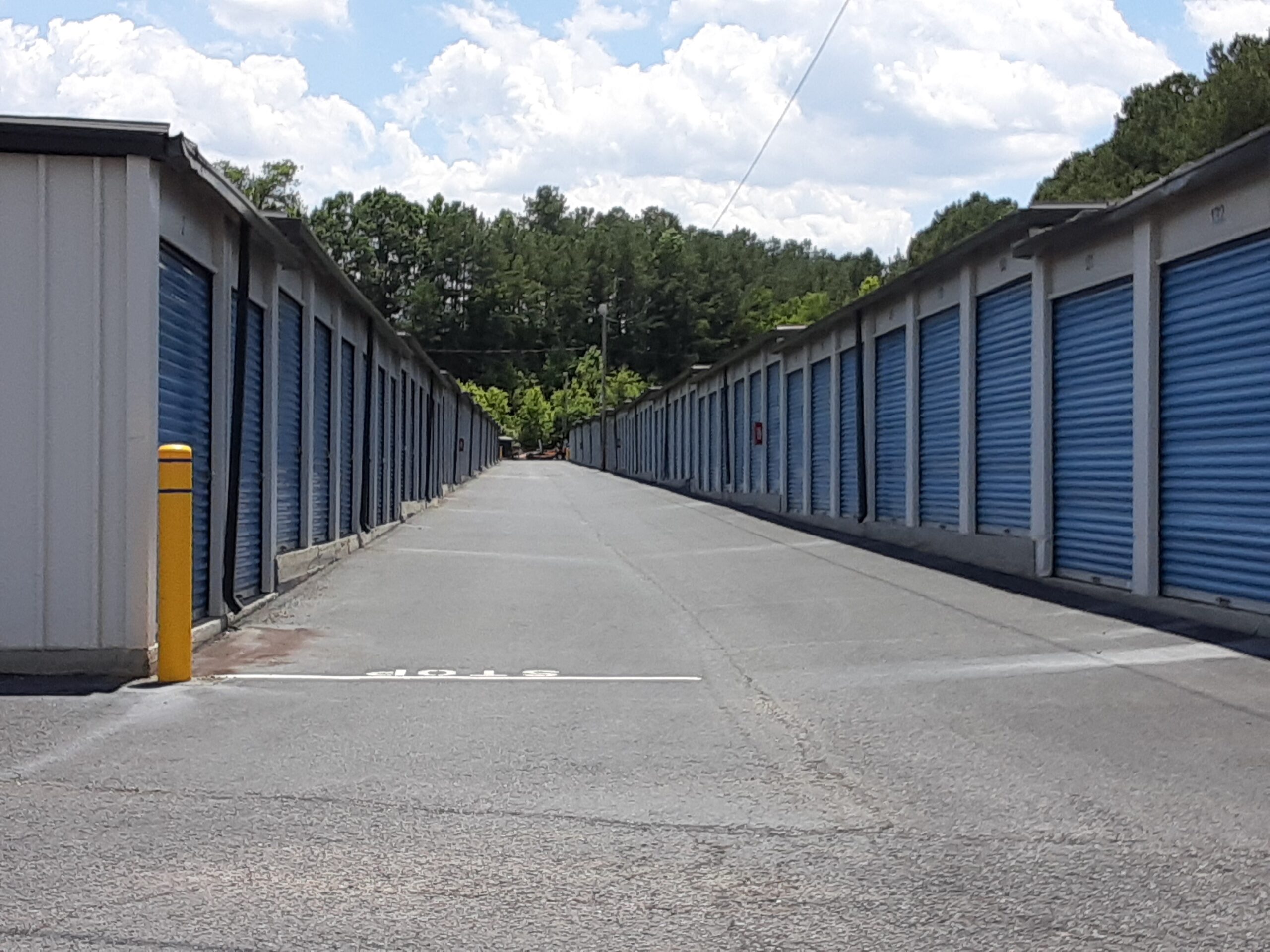 Rows of outdoor drive-up storage units.