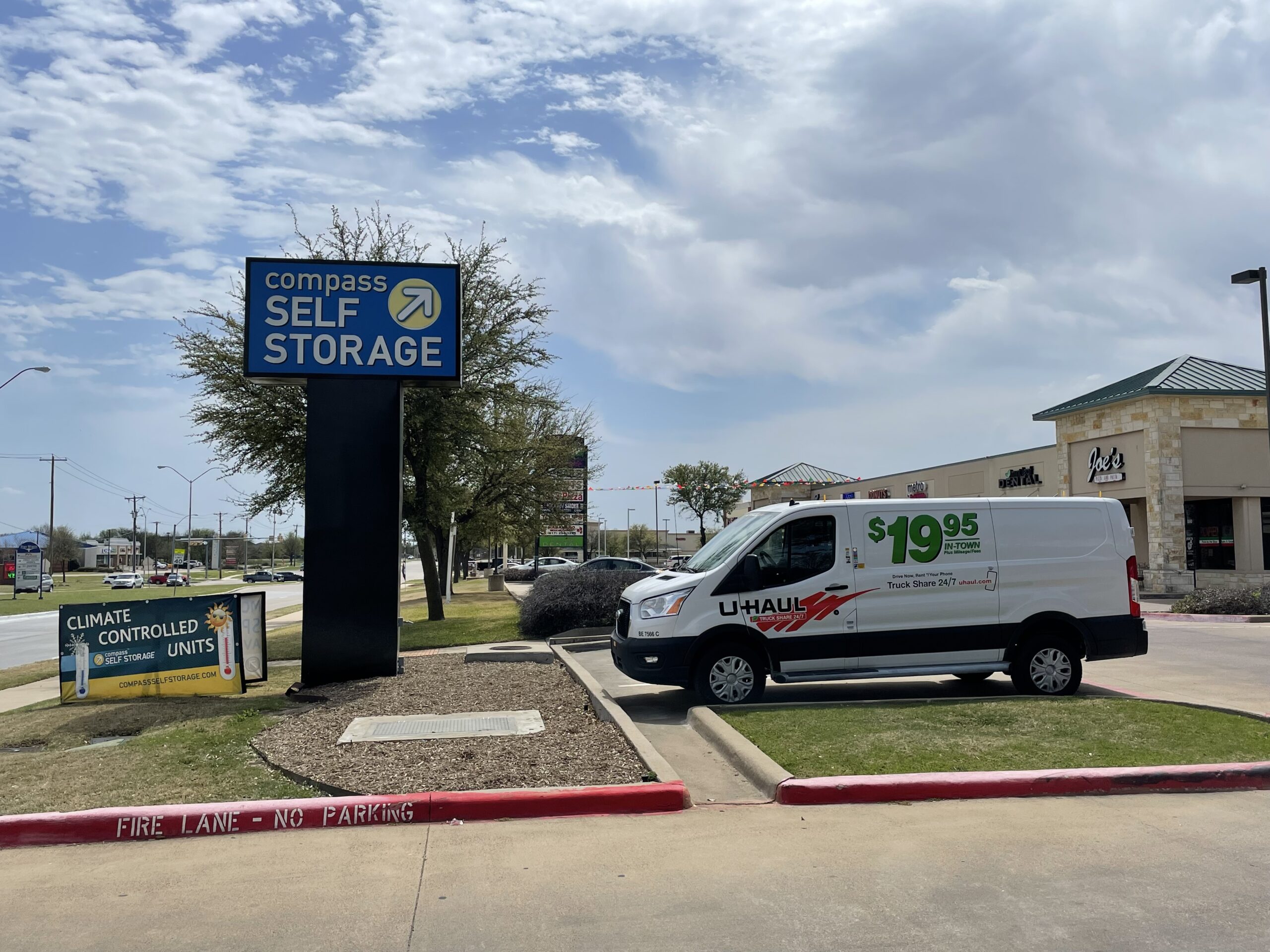 Facility signage at Compass Self Storage.