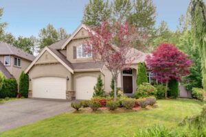 A nice suburban house with a well-kept lawn and landscaping